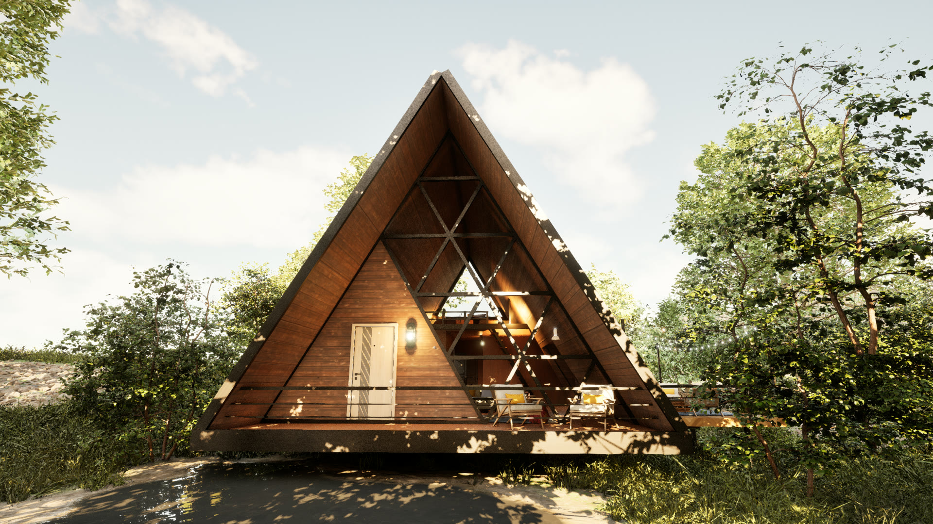 The A-frame cabin from the front, its glazed gable facing a clearing